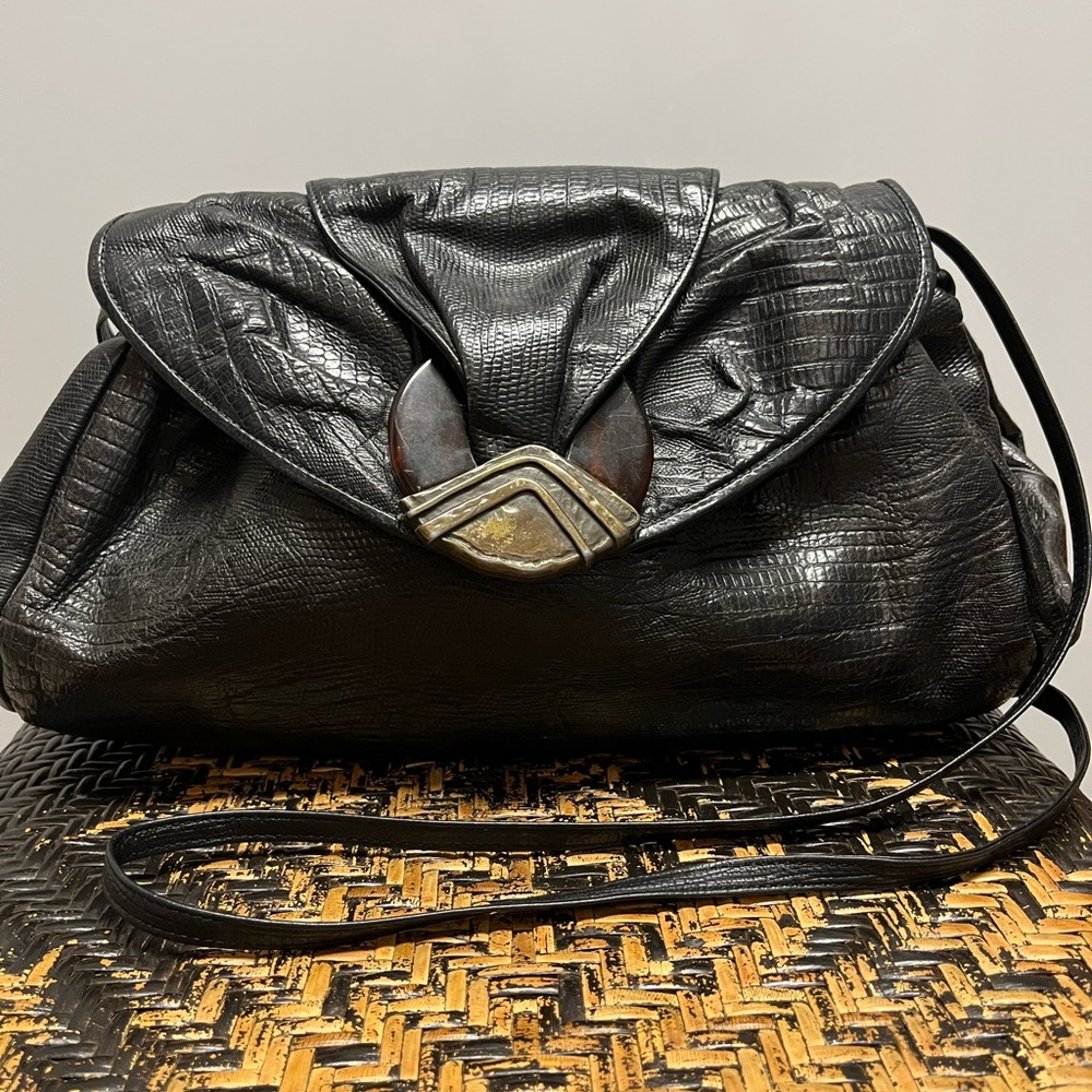 Vintage 80’s leather cross body purse by Sharif